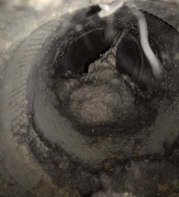 Years of dust with mold growing inside an air ducts.